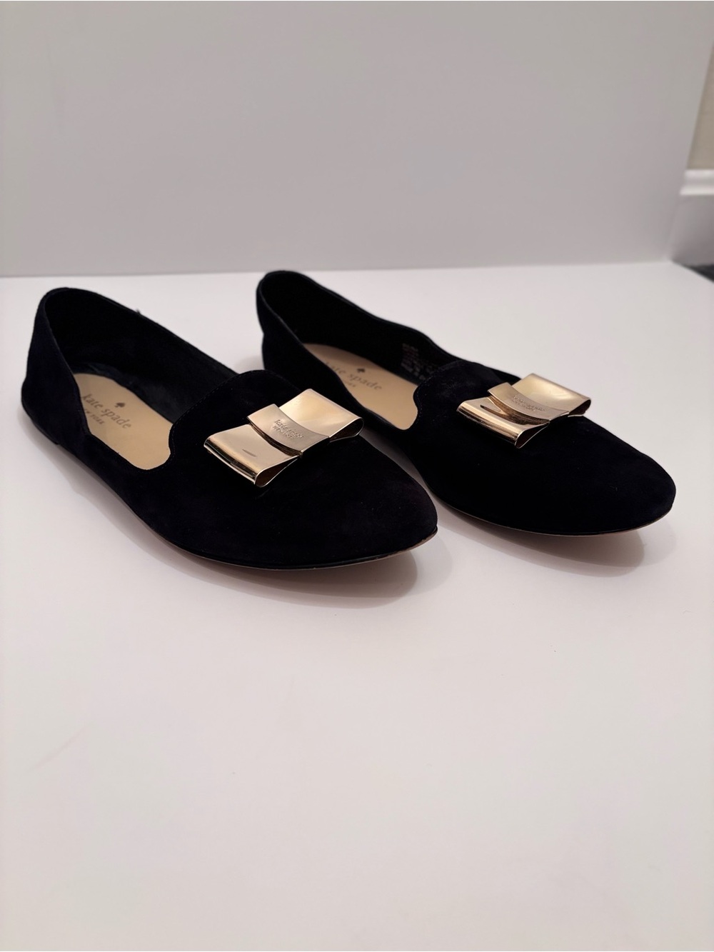 kate spade Black Suede Flats with Gold Bow Accent